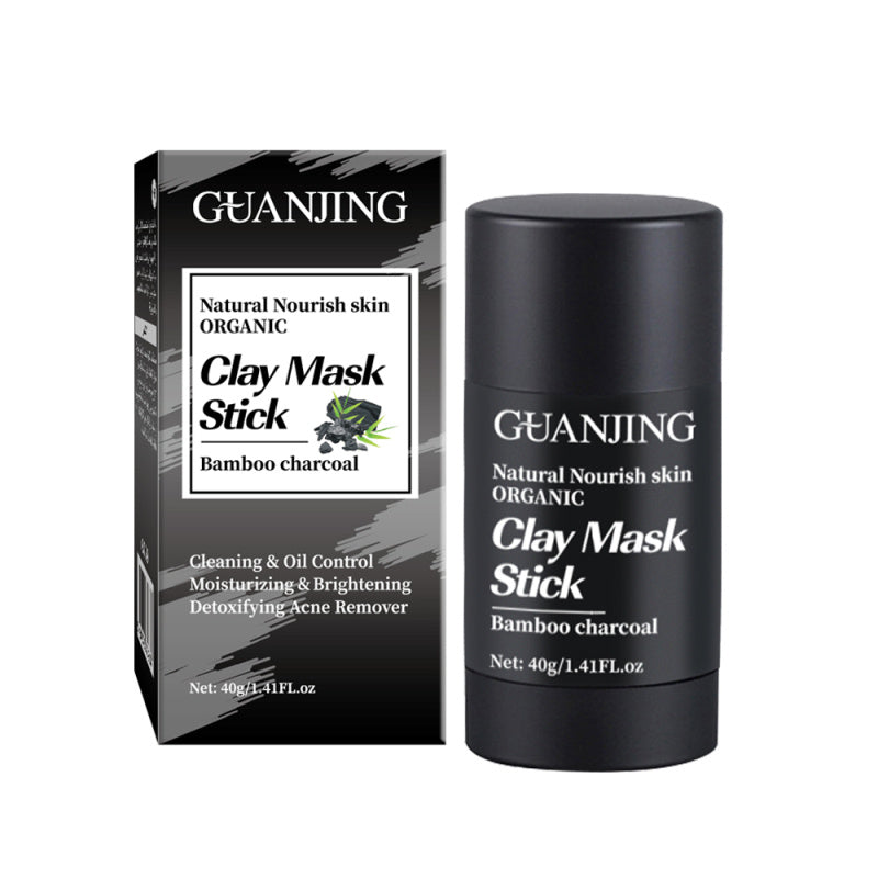 Charcoal mask stick applied to T-zone for oil control