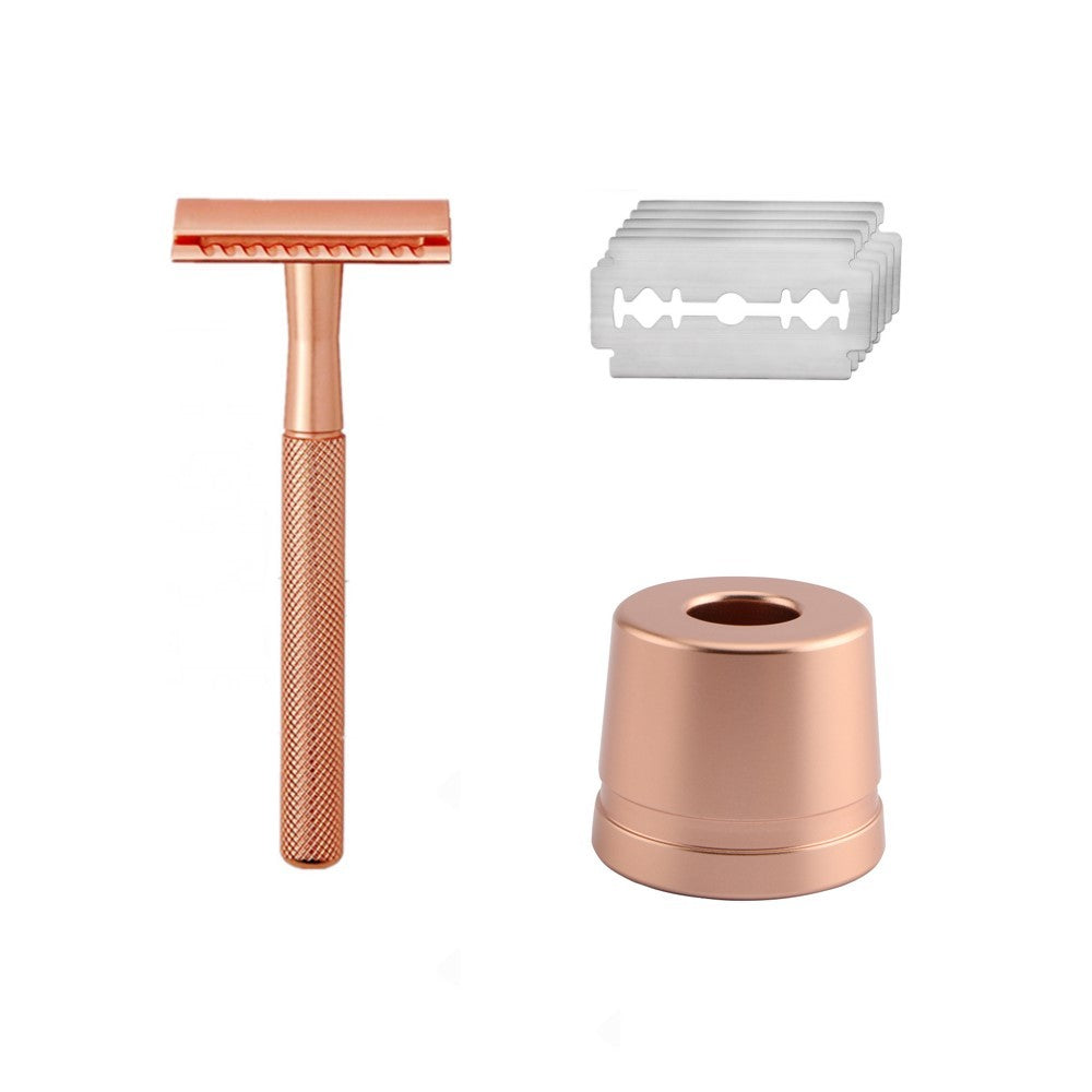 A rose gold metal safety razor with a durable stainless steel handle, alongside five premium razor blades, displayed against a white background.