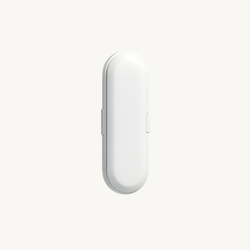 White electronic device on a light gray background